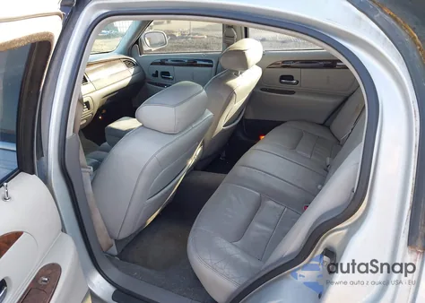 1998 Lincoln Town Car Signature из США, поврежденный, VIN 1LNFM82WXWY655710